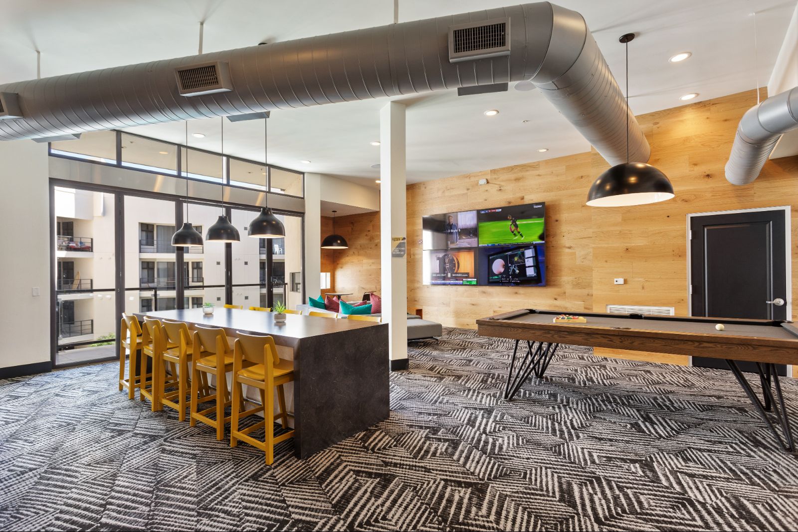 Clubhouse Entertainment Area with TV and Pool Table