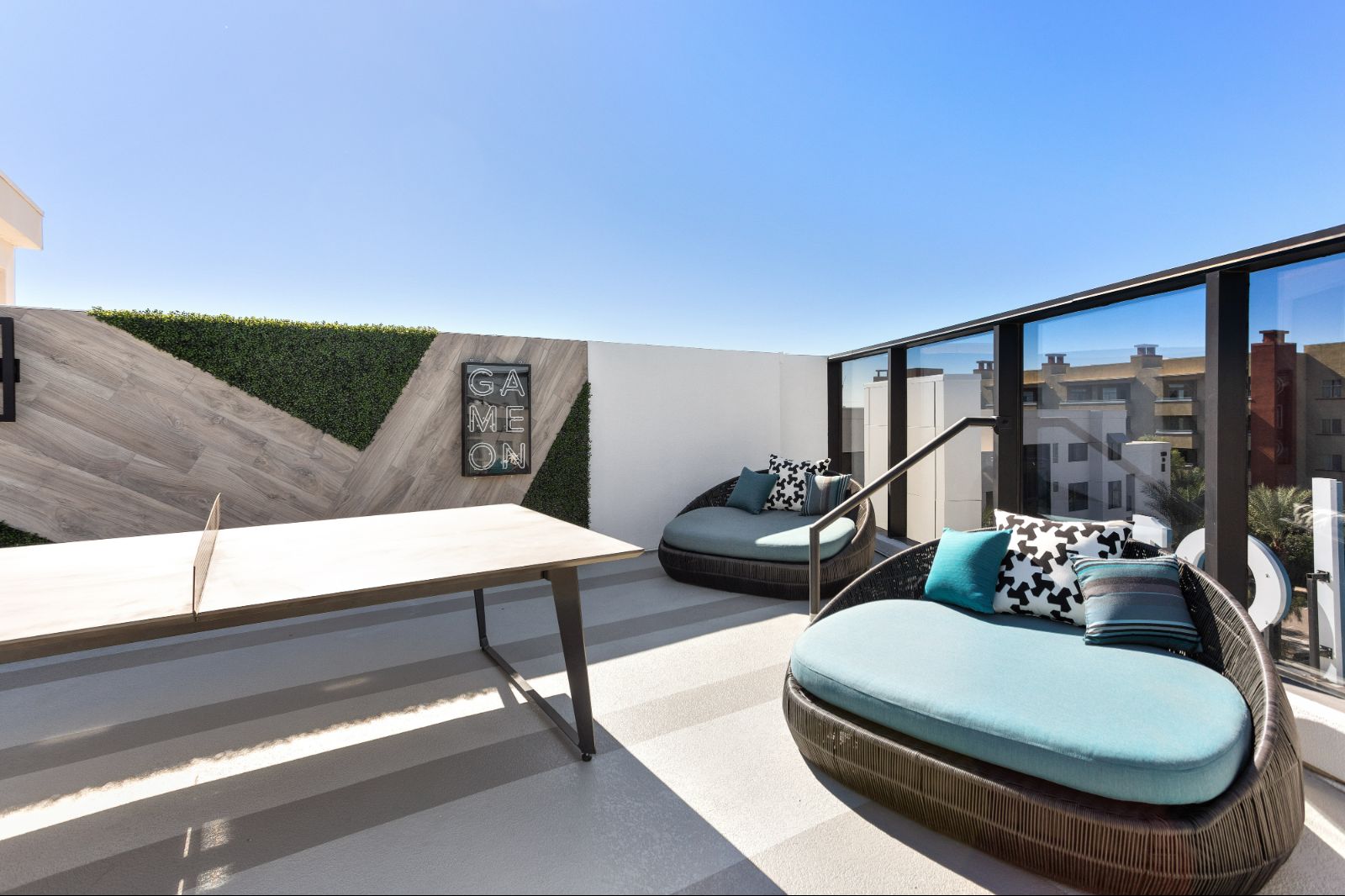 Outdoor Lounge with Comfortable Seating and Ping Pong Table